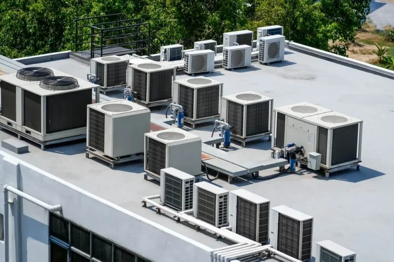 Rooftop commercial HVAC units on a building, illustrating common commercial HVAC problems in California.