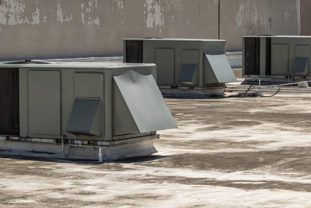 Older commercial rooftop HVAC units ready for retrofit and energy-efficiency upgrades