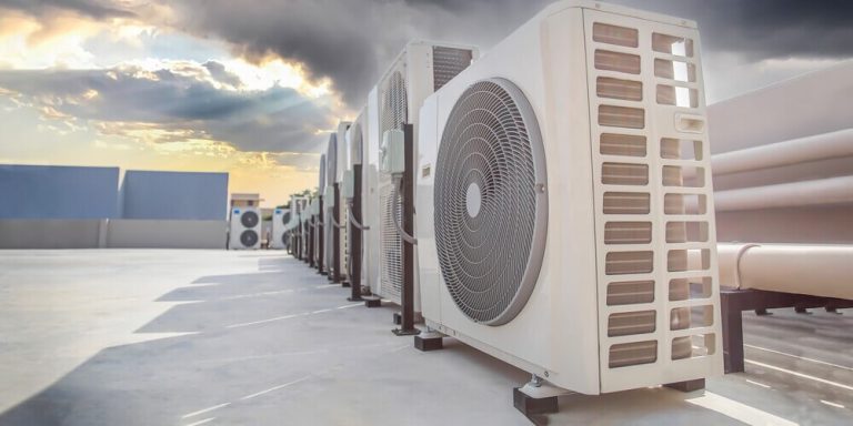Commercial rooftop HVAC systems on a large building in Orange County