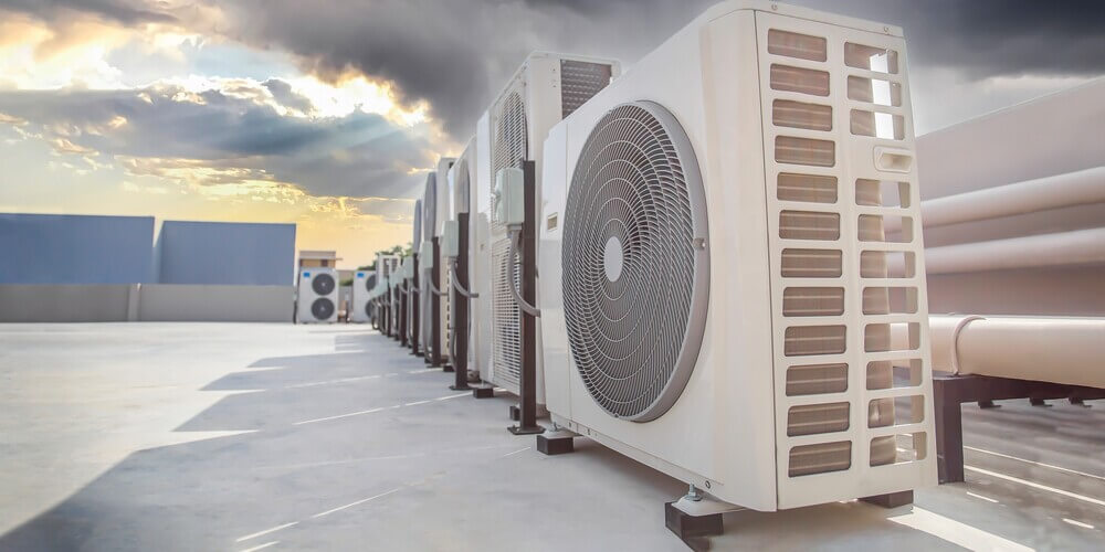 Commercial rooftop HVAC systems on a large building in Orange County