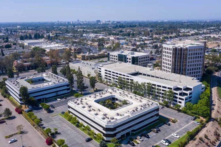Commercial office buildings and rooftop HVAC systems in Orange County affected by HVAC emergencies.